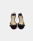 Purple sandals with black stones