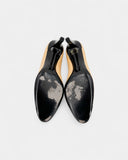 Talons beiges et noirs avec logo