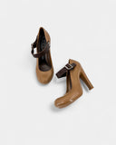 Brown rubber pumps with strap