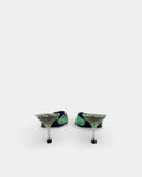 Mules en cuir imprimé python vert et marron