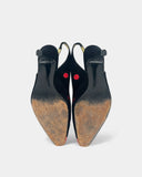 Black slingbacks with red polka dots