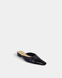 Mules en cuir python et cuir noir