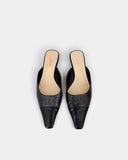 Mules en cuir python et cuir noir