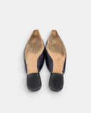 Mules en cuir python et cuir noir