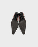 Pink pumps with a reptile print