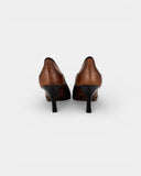 brown leather pumps