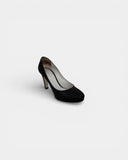 Textured black heeled pumps