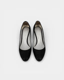 Textured black heeled pumps