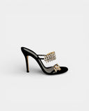 Black satin heeled sandals adorned with crystals