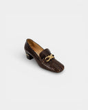 Brown heeled loafers with gold detail