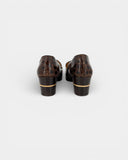 Brown heeled loafers with gold detail