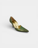 Metallic green heeled pumps