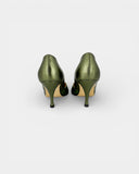 Metallic green heeled pumps