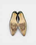Metallic green heeled pumps