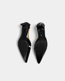 Black and orange pumps