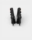 Black and gold high-heeled pumps from the Fairy 2008 collection