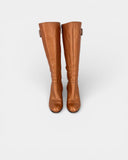 Bottes en cuir à talon compensé